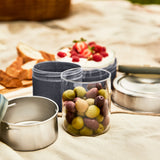Black+Blum glass lunch box in slate with a secure lid, ideal for to-go lunches and picnics.