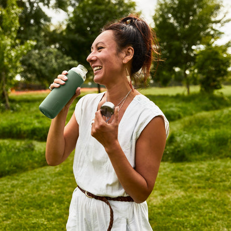 BLACK+BLUM TO-GO GLAS water bottle in ocean blue with a sleek design, 600 ML capacity, made of durable glass.