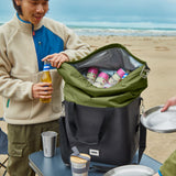 Black+Blum insulated cooler bag in moss color, open to show spacious interior and included bottle opener, ideal for beach outings.