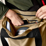 BLACK+BLUM insulated tote bag with a sleek black design, ideal for picnics and outdoor meals.