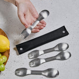 Set of four BLACK+BLUM Göffel stainless steel sporks in a case, ideal for to-go lunch and outdoor dining.