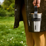 Black+Blum stainless steel Becher-Set for TO-GO lunch, four durable cups shown outdoors in use.