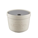 Mason Cash 2-in-1 garlic container made of stoneware, featuring a natural ceramic design for storing and peeling garlic.
