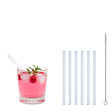Set of four glass drinking straws in various sizes, clear and reusable, by Profino Select.