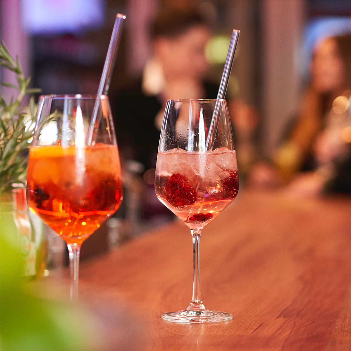 Set of four glass drinking straws in different sizes from Profino Select, with clear, smooth glass and varied lengths.