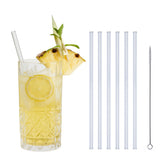 Set of four glass drinking straws in different sizes from Profino Select, clear and reusable for beverages.