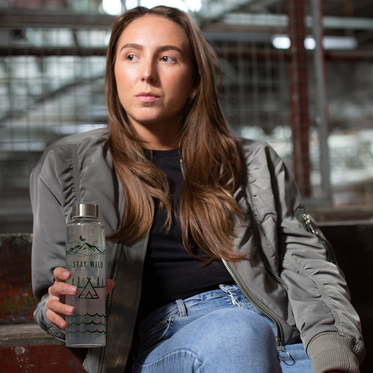 Glass water bottle from Typhoon's PURE Stay Wild collection, 600 ml capacity, with a clear design and flip-top lid.