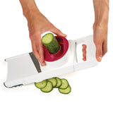 Zyliss 4-in-1 Hobel and Reibe with multiple stainless steel grating and slicing surfaces for versatile kitchen prep.