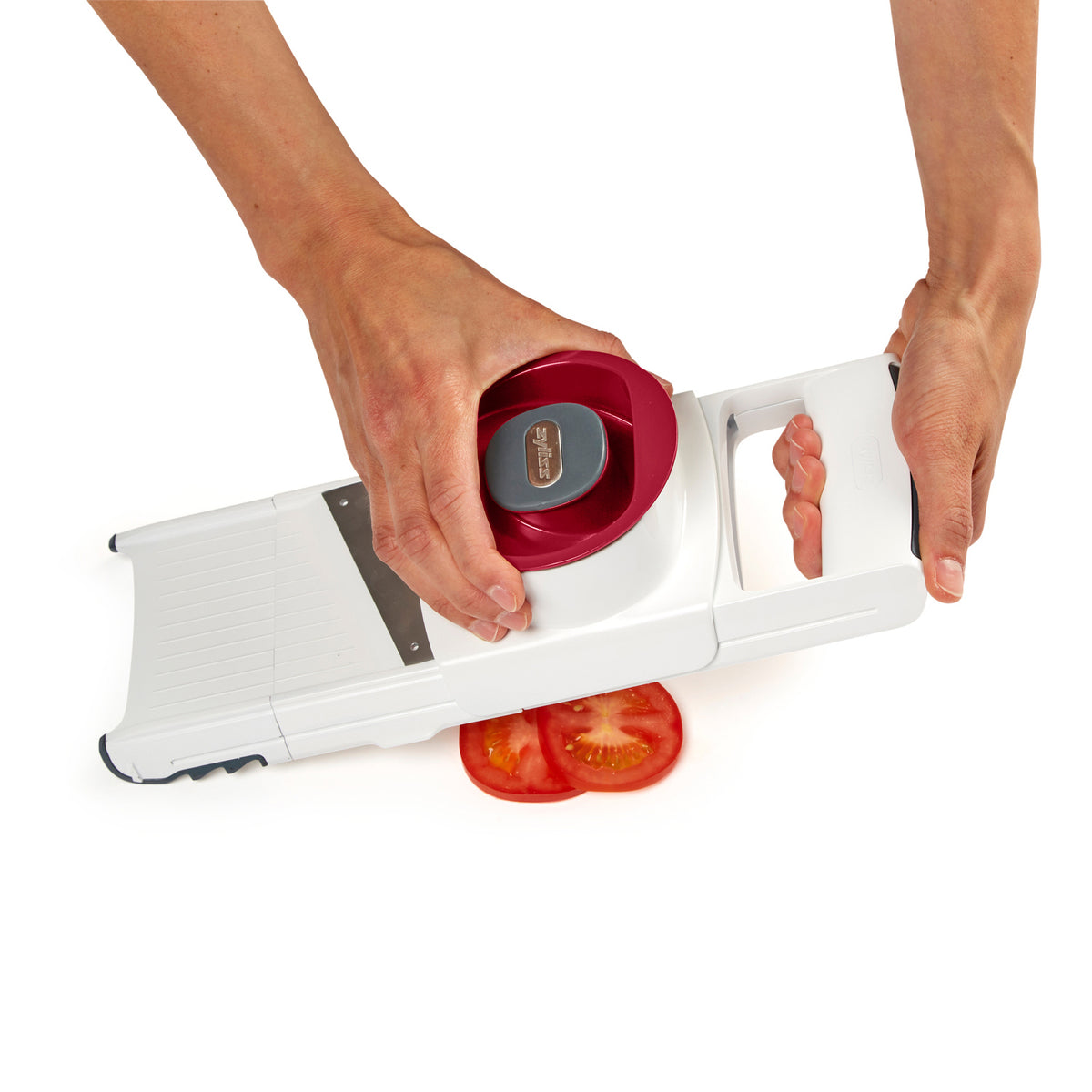 Zyliss 4-in-1 hobel and reibe with interchangeable blades for grating, slicing, and shredding in a compact kitchen tool.