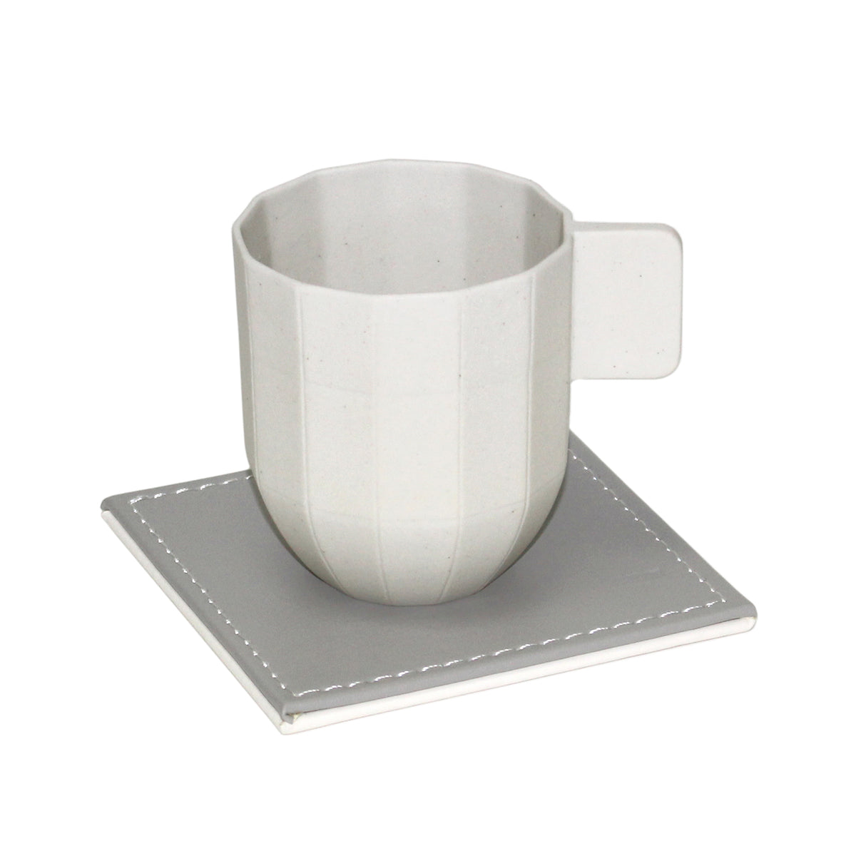 FREEFORM DUO 4-piece coaster set with stylish, durable cork and concrete designs, perfect for protecting surfaces.