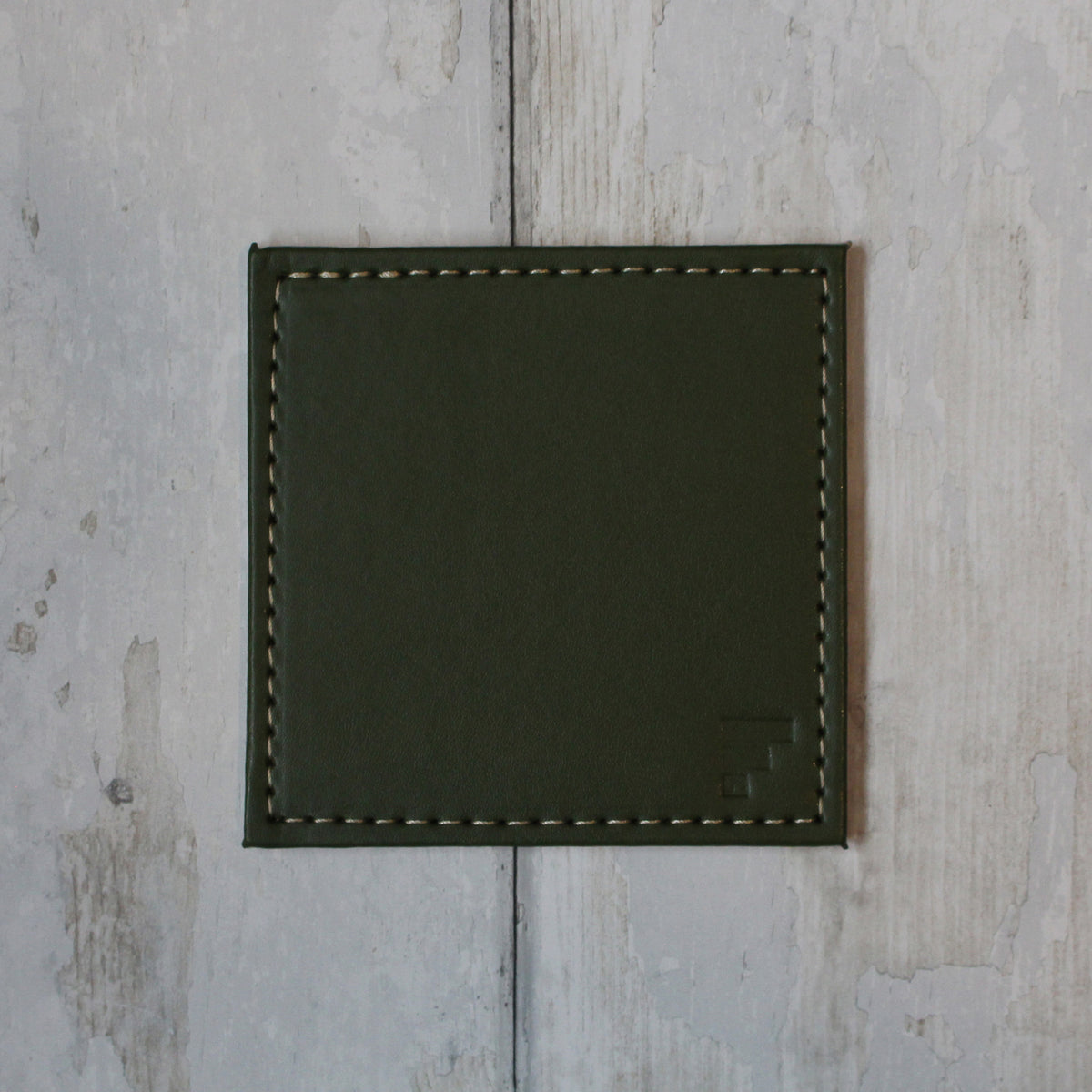 FREEFORM DUO 4-piece set of coaster undersets with modern design, perfect for protecting surfaces from hot or cold drinks.