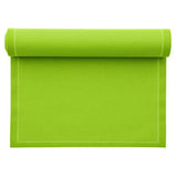 Set of pistachio-colored napkins and table mats from MY DRAP, featuring three stylish variants for elegant table settings.