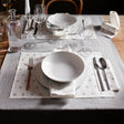 Silver Stars napkin and placemat set by MY DRAP, featuring festive star design in three stylish variants on a white background.