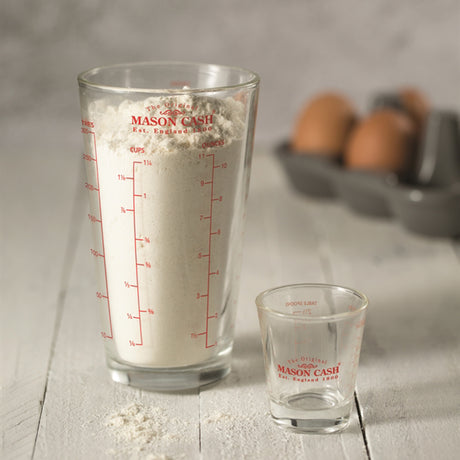 Clear glass measuring cup with 300 ml capacity from Mason Cash's Classic Collection, showing measurement markings and handle.