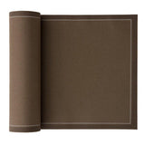 Taupe fabric napkins and placemats from MY DRAP, featuring elegant design and four stylish variants, ideal for table setting.